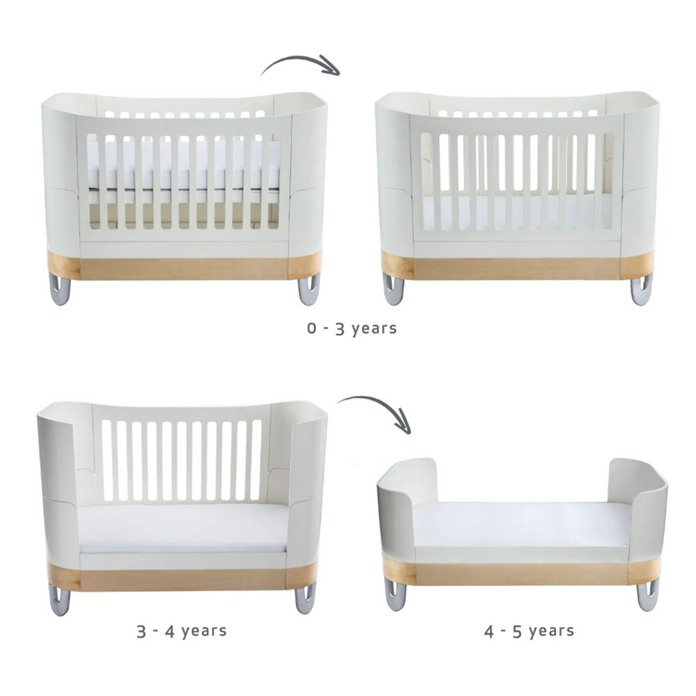 Gaia Baby Serena Real FSC certified birch wood nursery furniture cot bed in white natural with recycled alminium legs.