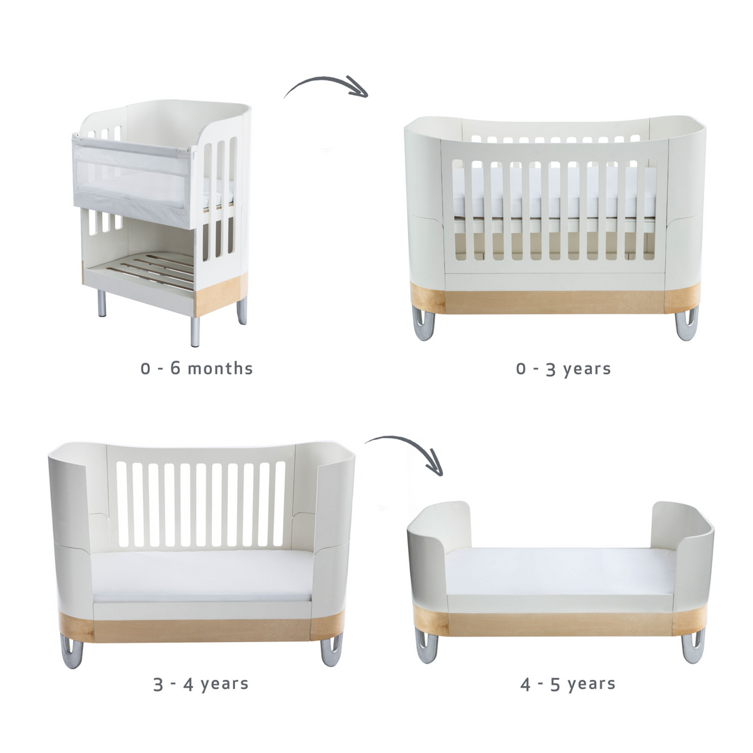 Gaia Baby Serena Co-Sleep Crib and Cot Bed made from sustainably sourced birch wood and non-toxic babysafe paint in all white with recycled aluminium legs.